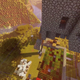 An isometric view of TheMisterEpic's Minecraft chunk, featuring some floating castle, a pen of sheet, and farming land.